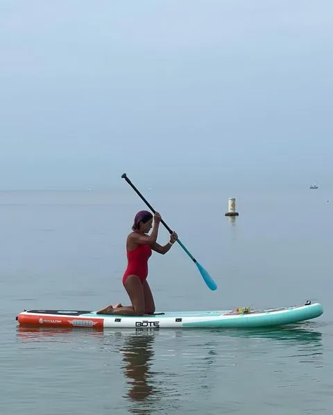 Woman enjoying the shallow waters of Hobie Island Beach Park