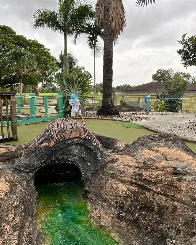 Palmetto-Mini-Golf-has-a-stunning-outdoor-setting-with-a-cave-waterfall-and-lagoon
