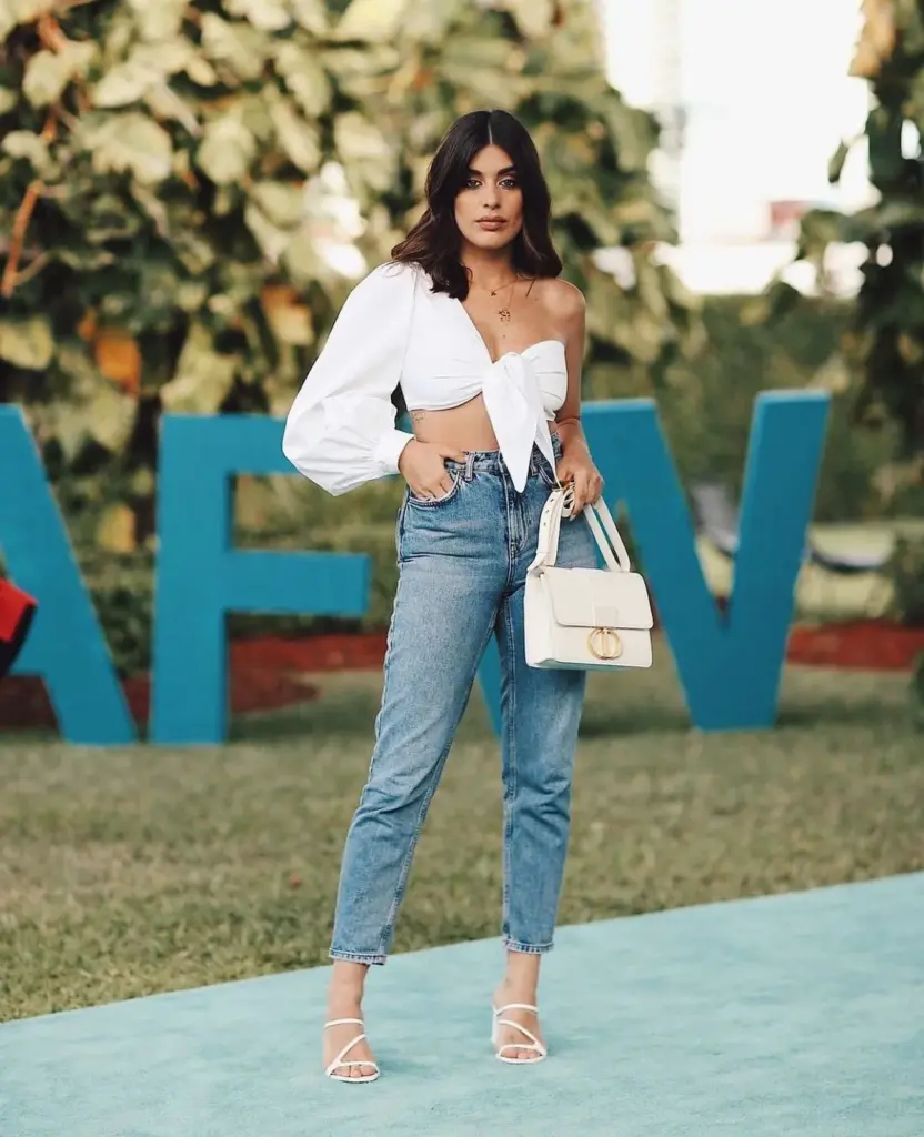 A crop top with blue jeans - @miamifashionweek Instagram