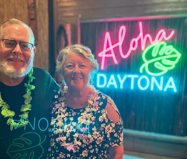 An old couple at the Polynesian Fire Luau and Dinner Show - @polynesianfire Instagram